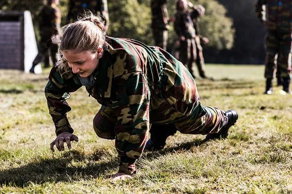 Crown Princess Elisabeth participates in an intensive sports program, and she learns to use camouflage and use weapons