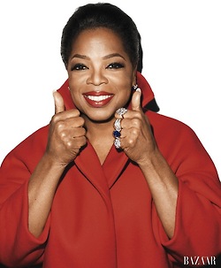I love this new pictures of Oprah...she rocks a bright red Jil Sander