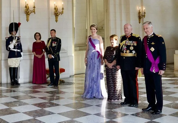 Queen Mathilde wore Natan Couture floral dress, Maison Natan dress, and Aramani blue one shoulder silk dress. Queen Fabiola's Wolfers tiara