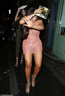 b Big Brother UK star Lateysha Grace reveals all as she goes braless beneath net mini dress