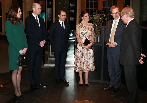 Kate Middleton wore a new bespoke Catherine Walker coat and dress. Duchess accessorised her coat with a faux fur collar and faux fur cuffs from Troy London