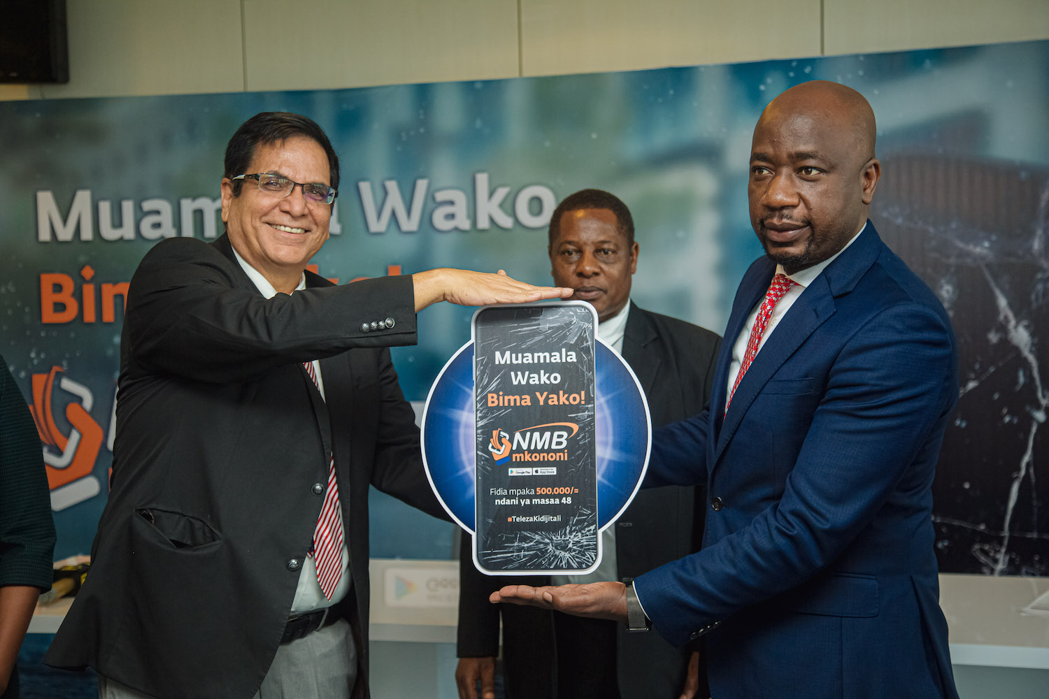 Benki ya NMB yazindua Bima ya simu za mkononi MICHUZI BLOG