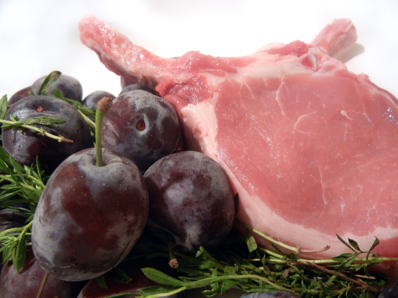 Grilled pork chop with savory plum sauce