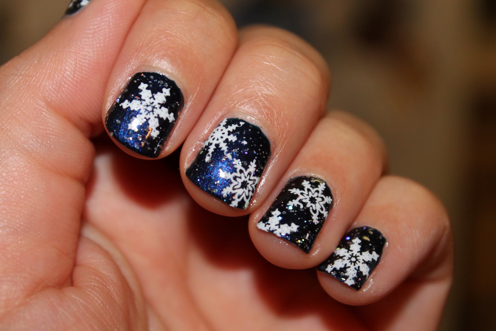 1. Pink and White Snowflake Nail Design - wide 5