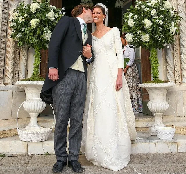 Princess Marie Astrid wore the Kinsky Honeysuckle tiara from the collection of the Princely Family of Liechtenstein. Wedding dress