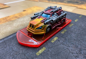 Image showing Car Wars miniatures on a road tile