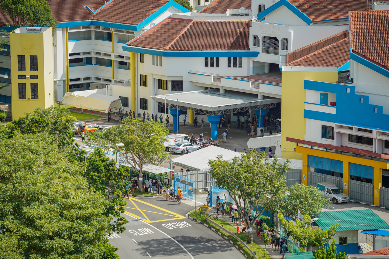 A long queue was formed at the screening centre at the former Bishan Park Secondary School, on 03 May 2021.