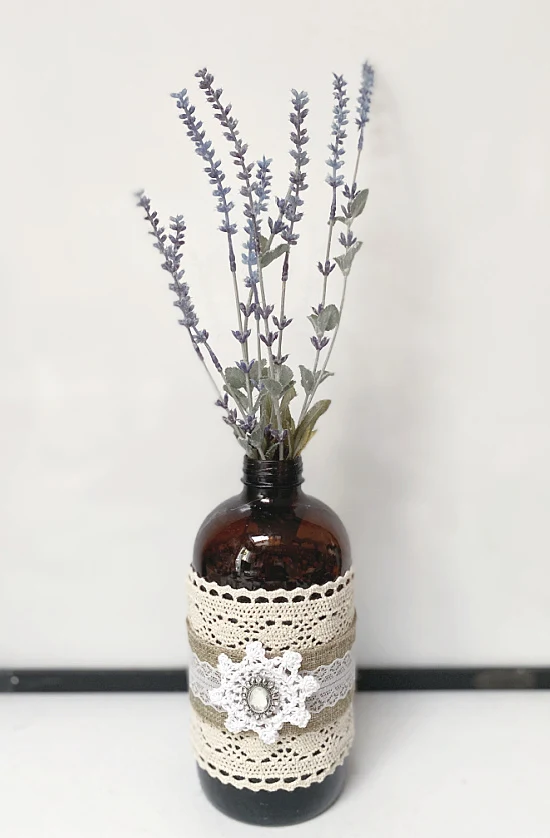 lace wrapped bottle with lavender