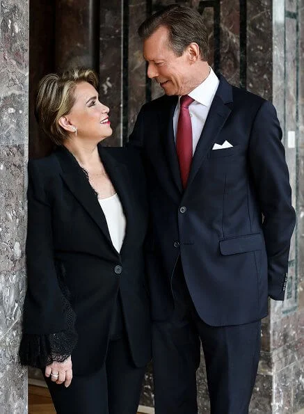 Grand Duchess Maria Teresa wore a new black open sleeves lace trimmet viscose crepe jacket from Alexander McQueen