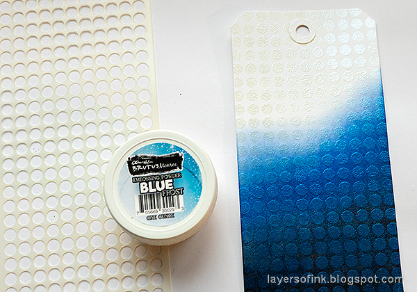 Layers of ink - Celebrate 2021 Tag Tutorial by Anna-Karin Evaldsson. Apply Blue Frost embossing powder through Sequin Builder stencil.
