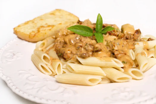 Sun-Dried Tomato Chicken Pasta with fresh basil