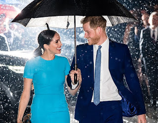 Meghan and Harry share an umbrella at Endeavour Awards Ceremony 2020
