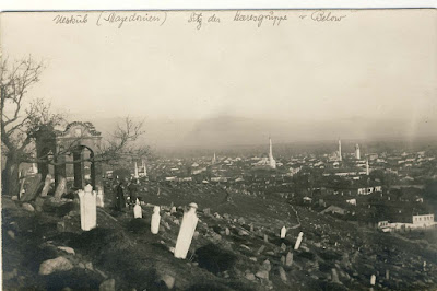 Turkish cemetery on the northwest part of  Bitola. In the distance can be seen: the Clock Tower, Yeni Mosque, Isak Mosque and Besim Pasha Mosque. In the description of postcard, by mistake, stands Uskub (Skopje) (Mazedonien)