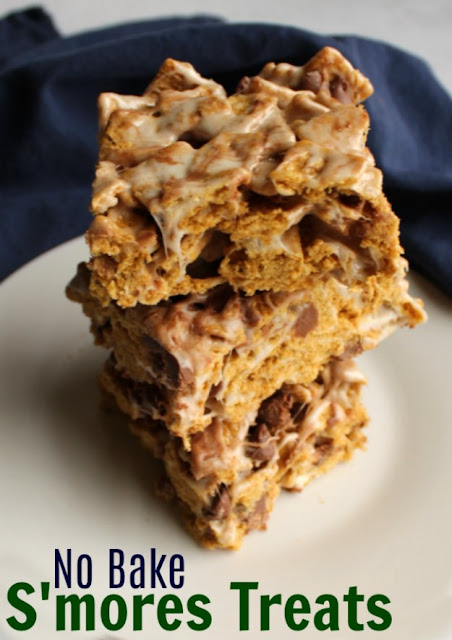 You can easily make these s'mores bars in just a few minutes and with a few simple ingredients. They travel well, everyone loves them and the kids can help make them. You can take them to parties, pack them in lunch boxes or serve them as an after school snack. It's all of the flavor of s'mores without a campfire... or an oven! You can easily make these s'mores bars in just a few minutes and with a few simple ingredients. They travel well, everyone loves them and the kids can help make them. You can take them to parties, pack them in lunch boxes or serve them as an after school snack. It's all of the flavor of s'mores without a campfire... or an oven!