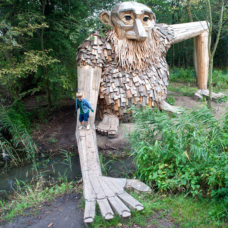 Artist Creates Giant Wood Sculptures and Hides Them in Copenhagen Forests