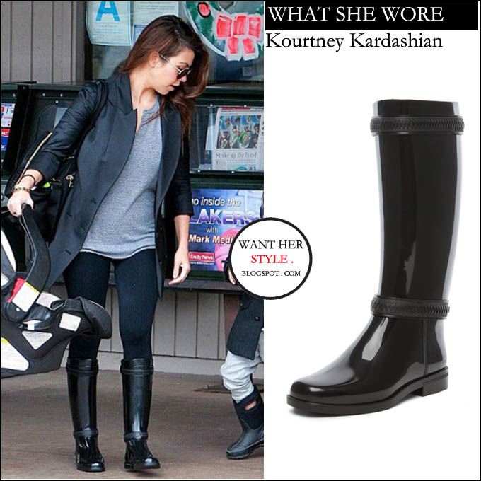 WHAT SHE WORE Kourtney Kardashian in black rubber rain boots in