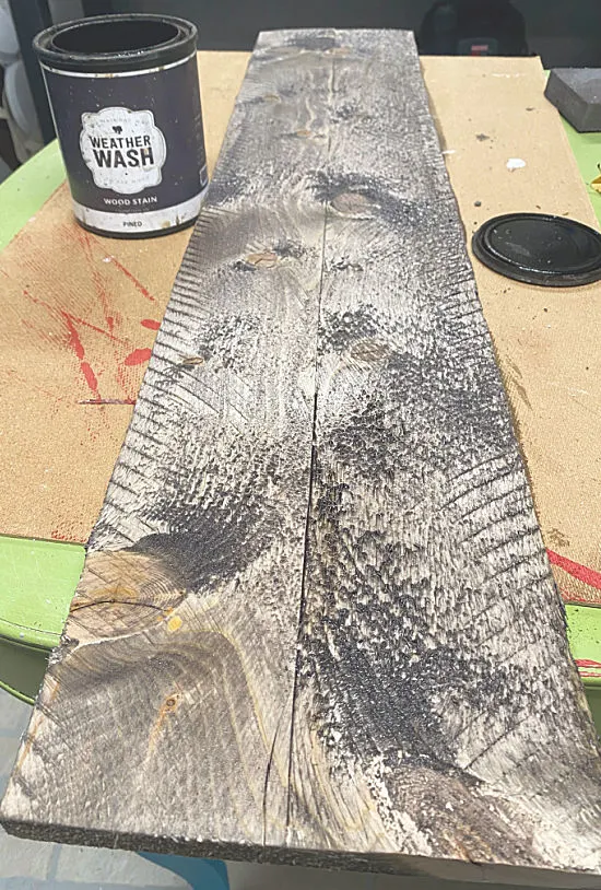 wooden board with weather wash stain