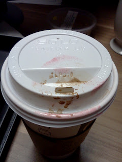 Starbucks disposable cup stained with pink lipstick and chocolate from my morning mocha
