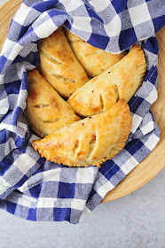 These savory chicken and vegetable hand pies are so flavorful and delicious! They're compact and portable, and perfect for an easy dinner!