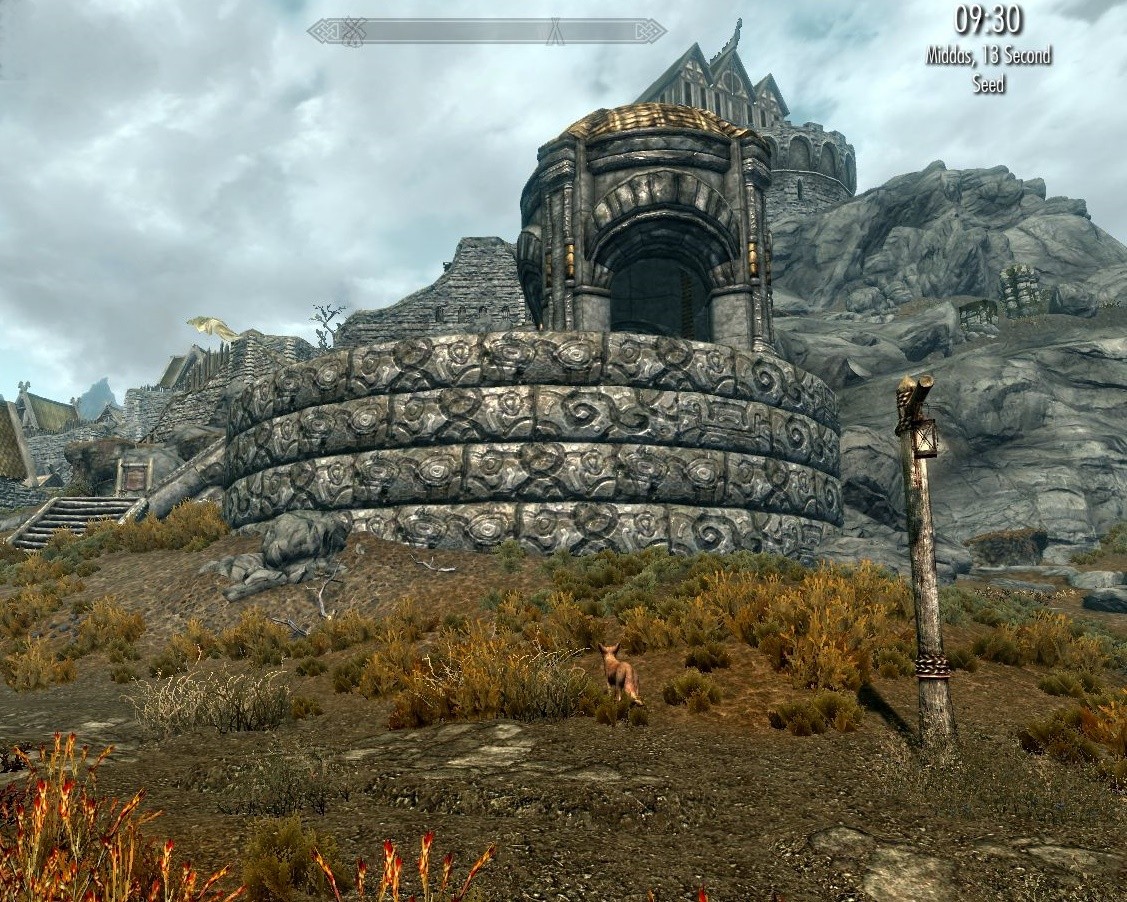 stone pavilion up on a round raised stone platform whosewalls have elaborate Dwemer carvings