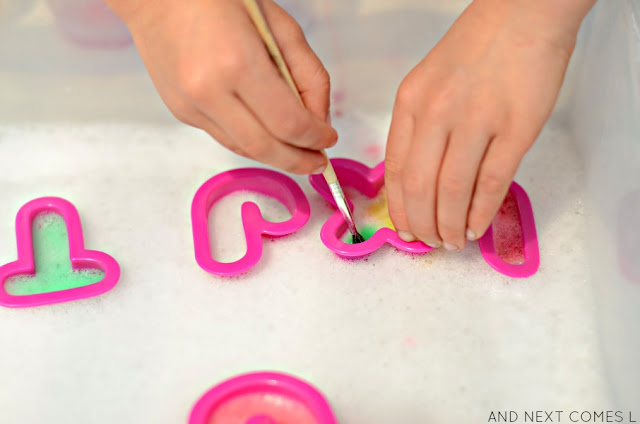 Prewriting sensory activity for toddlers and preschoolers using soap foam from And Next Comes L