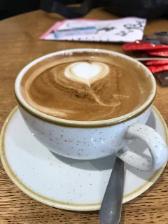 cream coffee with heart on foam