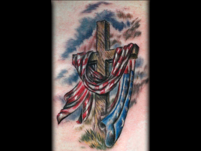 Arrows And Embers Custom Tattooing Cross with American Flag Tattoo