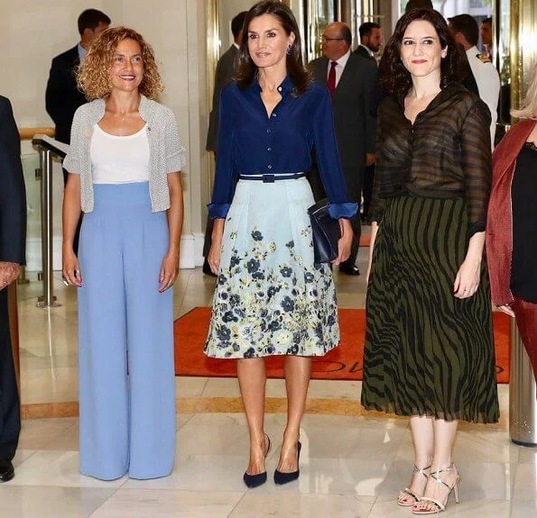 Queen Letizia wore Carolina Herrera flower party skirt, Carolina Herrera high-heel slingback pumps, blue diamond earrings