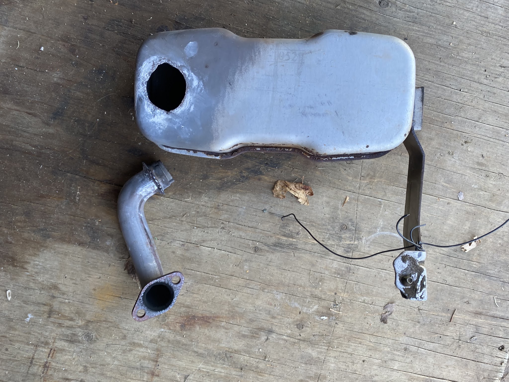 Repairing a Lawn Tractor Muffler A Tale of Baling Wire and Bubble Gum