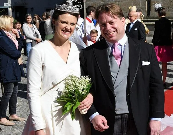 Grand Duchess Maria Teresa, Belgian Princess Astrid and her husband Prince Lorenz at wedding ceremony in Germany. wedding dress and tiara