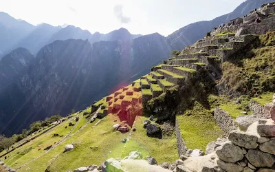 Machu Picchu Images: Picture of the sun rising over the terraced farms at Machu Picchu