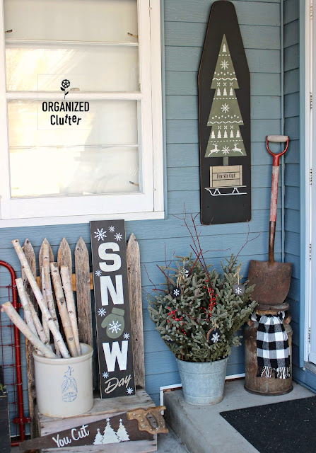 A Painted & Stenciled Crate In A Rustic Outdoor Christmas Display