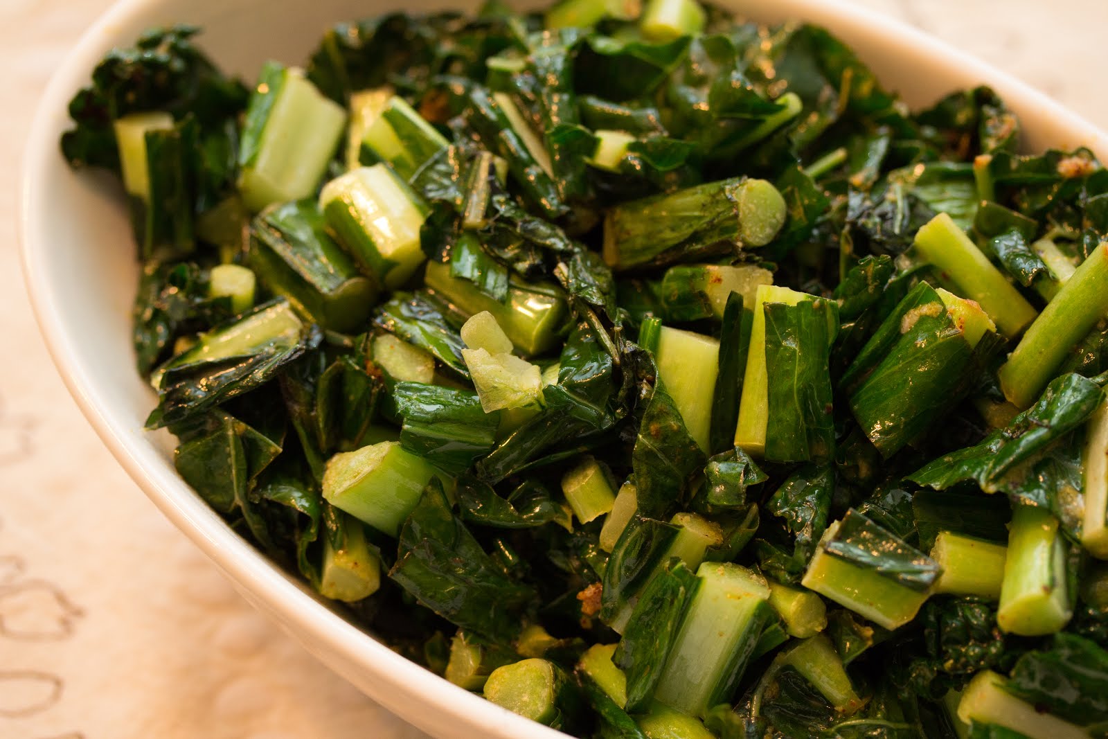and she cooks too! Warm Wilted Kale Salad with Lemon, Garlic, and