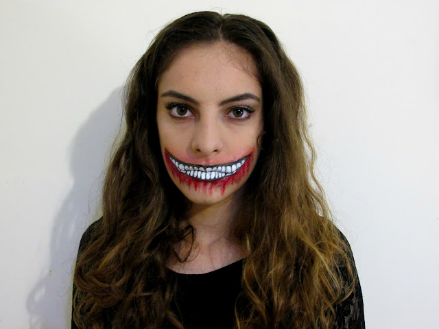 Halloween makeup, ripped mouth, dripping bood