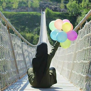 woman and full color balloons