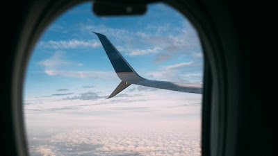 HD wallpaper porthole, plane, wing, clouds HD wallpaper porthole, plane, wing, clouds