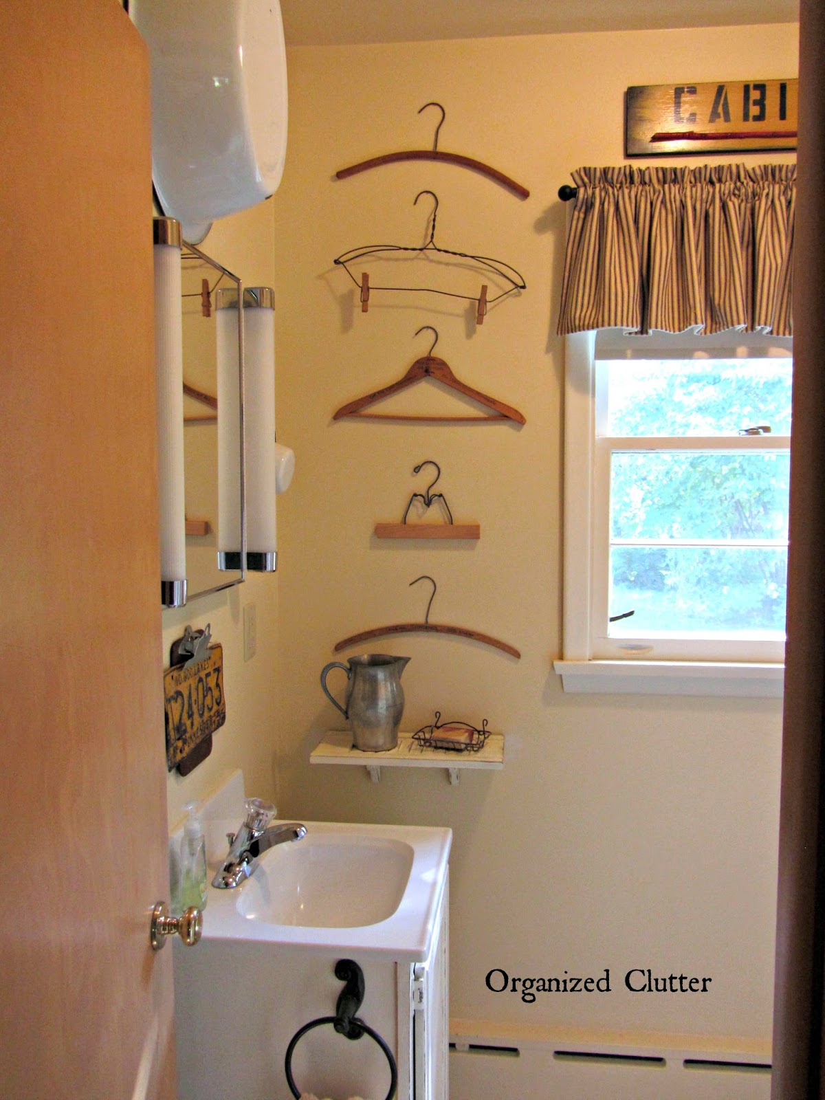 Vintage Rustic Decor in a Small Bathroom www.organizedclutter.queen.blogspot.com