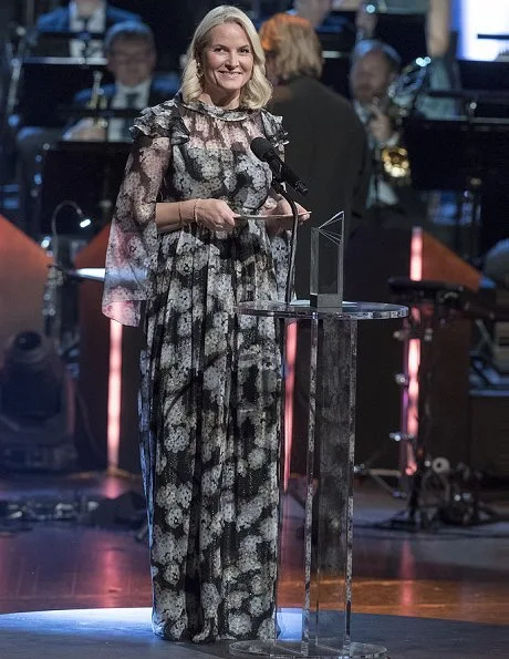 Crown Princess Mette-Marit is wearing her Ole Yde gown. She first wore the gown at the gala dinner for the Nobel Peace Prize in 2014