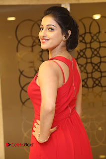 Actress Mouryani Stills in Red Dress at Intlo Deyyam Nakem Bhayam Trailer Launch  0028