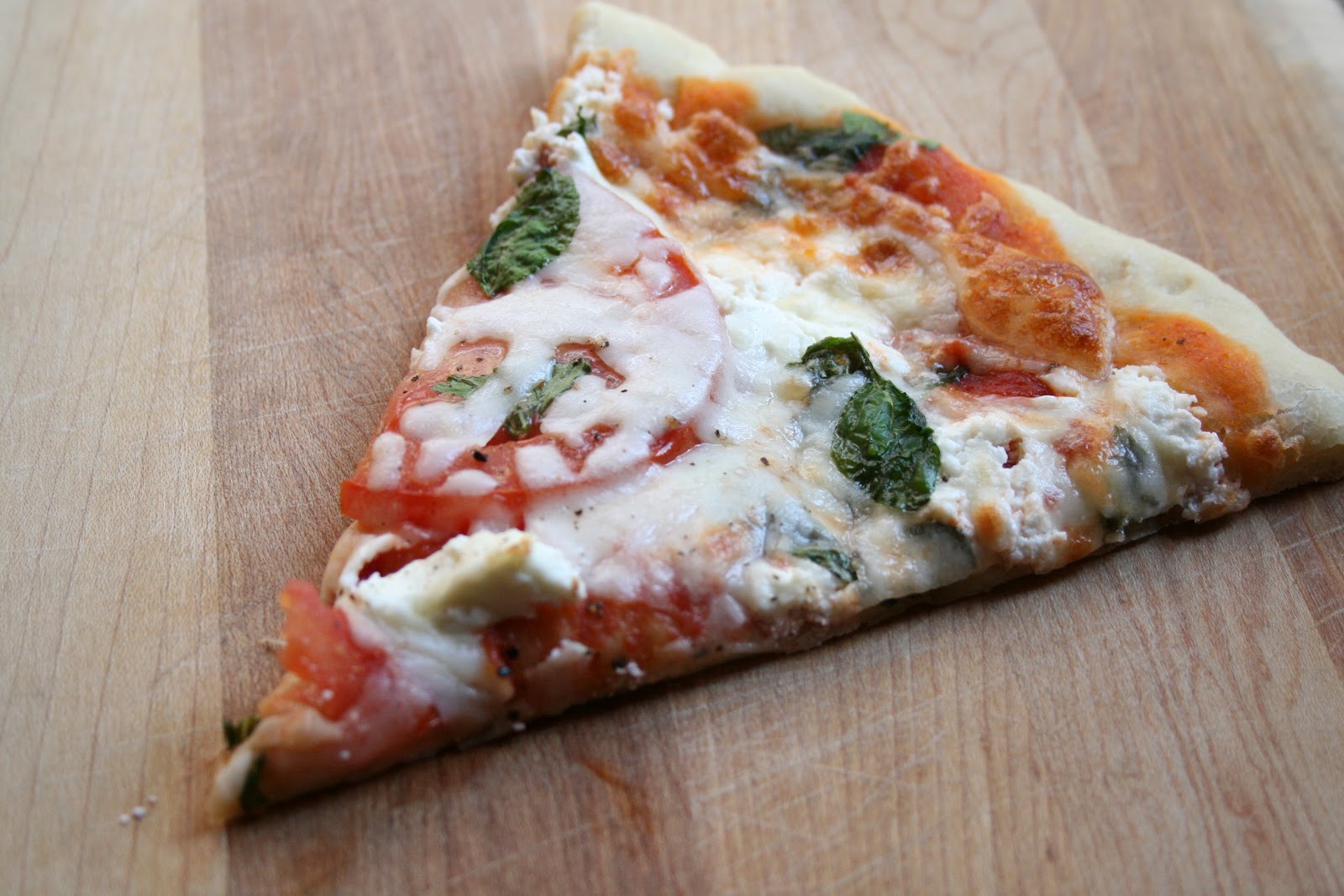 The Nesting Corral Tomato, Basil, & Goat Cheese Pizza