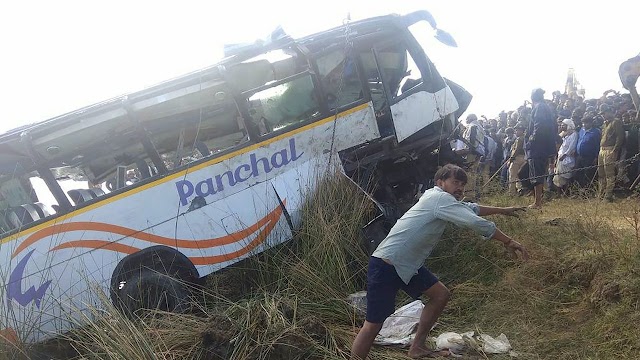 At least 32 dead as bus plunges off bridge in India