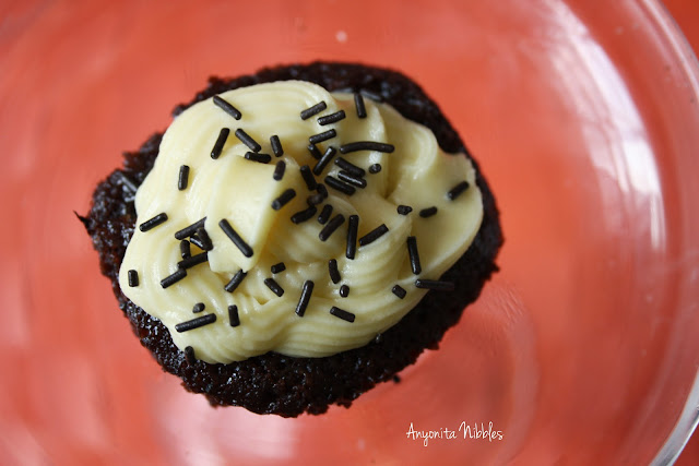 Salted caramel swirl applesuace brownies dressed with buttercrem and sprinkles