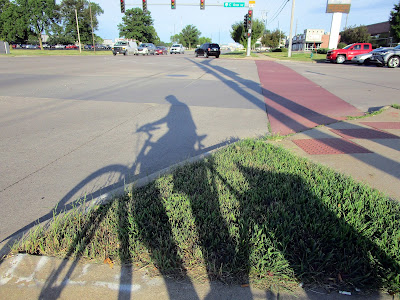 Shadow of a biker
