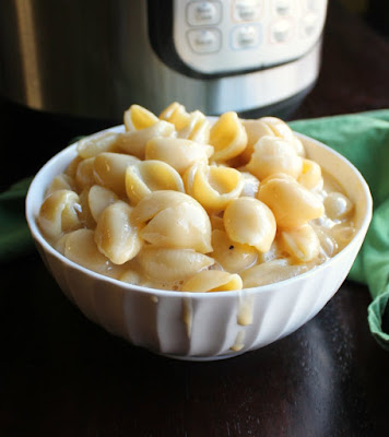 Pasta has to be one of the most versatile and universally loved foods out there. Come get inspired with some of the best noodle recipes out there! creamy cheesy mac and cheese in front of instant pot