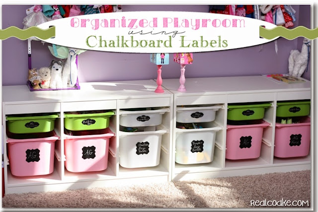 An organized playroom using chalkboard labels to help toy storage stay organized. #Organizing #Playroom #Chalkboard