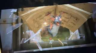 100 Gecs's visuals of a dirty laptop playing the movie Ratatouille