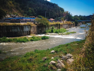 View Of River Water Flow Output Side Of The Dam In The Valley Of Hills Titab Ularan North Bali Indonesia