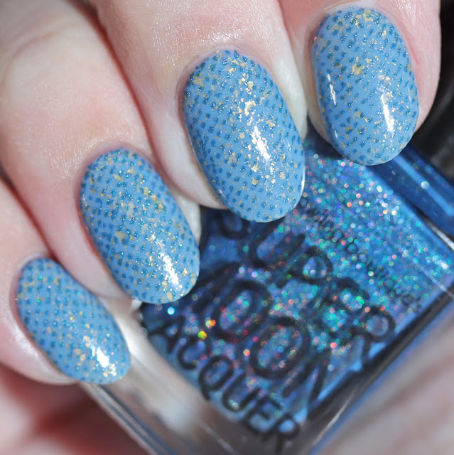 Supermoon Lacquer Blue Quasar stamped over Rogue Lacquer She's Stark Raving Mad using Lina Make Your Mark 01 plate