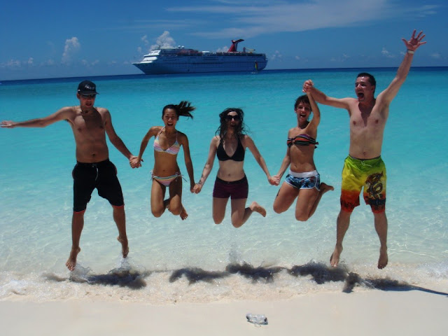 Cruise ship crew members on beach