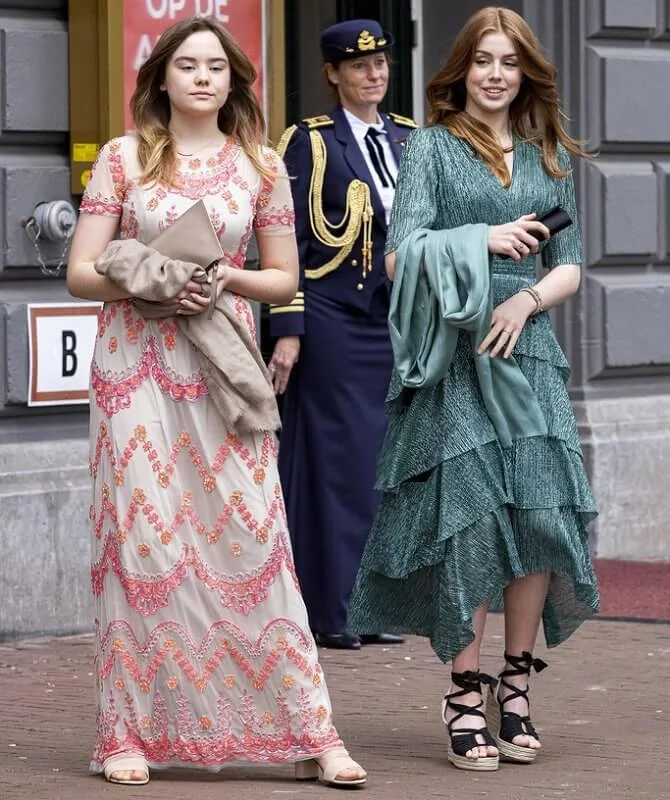 Princess Amalia and Princess Ariane in maxi dress by Needle & Thread, Princess Alexia in green dress by Maje, Maxima in blue dress by Iris van Herpen